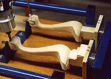 Photo of chair leg being carved.