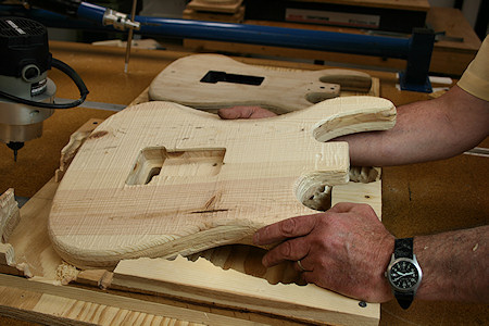 carving an electric guitar