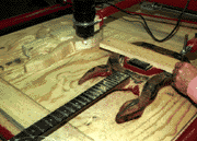 Allen Jones starting a guitar on the carver